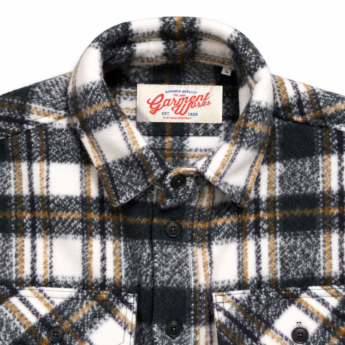 Close-up of forest green check overshirt collar and Garment Works woven label
