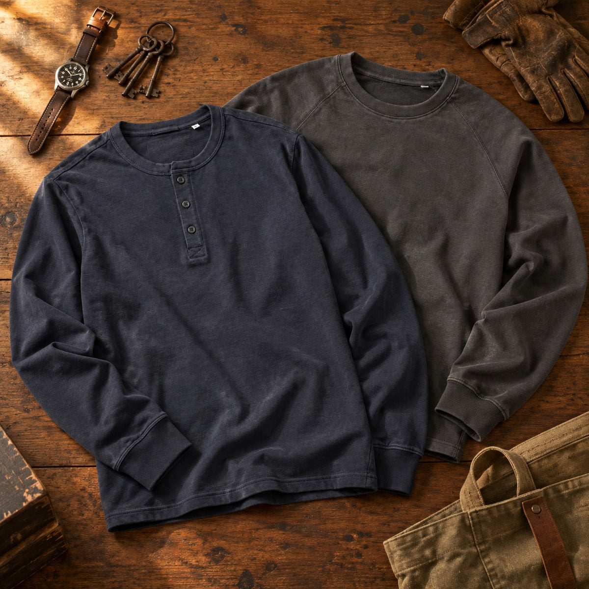 Tijuana long sleeve henley and Rhomb raglan top on a wooden table with a vintage watch